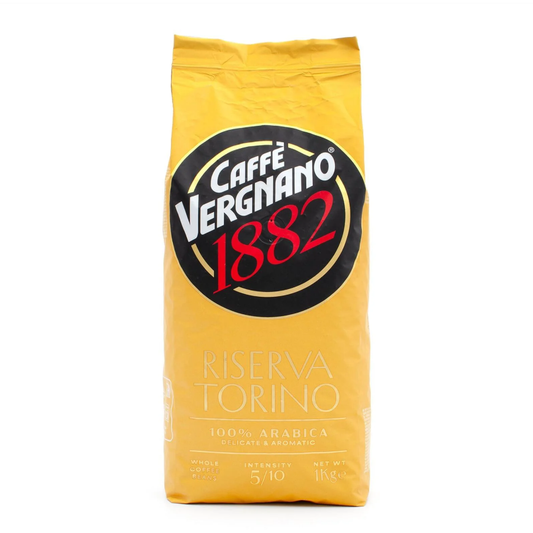 A 1 kg package of Caffè Vergnano Riserva Torino 100% Arabica whole bean coffee with elegant Italian branding, displaying the product name and design elements representing a premium Arabica coffee blend.