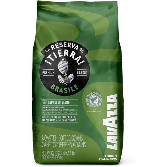 A 1000g bag of Lavazza Italia 'La Reserva de Tierra! Brasil' espresso blend coffee beans, featuring a green and dark green packaging design with a black circular logo.