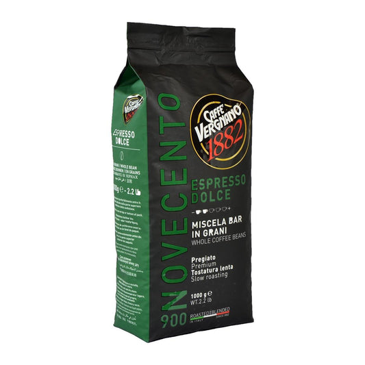 A 1 kg package of Caffè Vergnano Dolce 900 whole bean coffee with classic Italian branding, showing the product name and design elements representing a premium espresso blend.